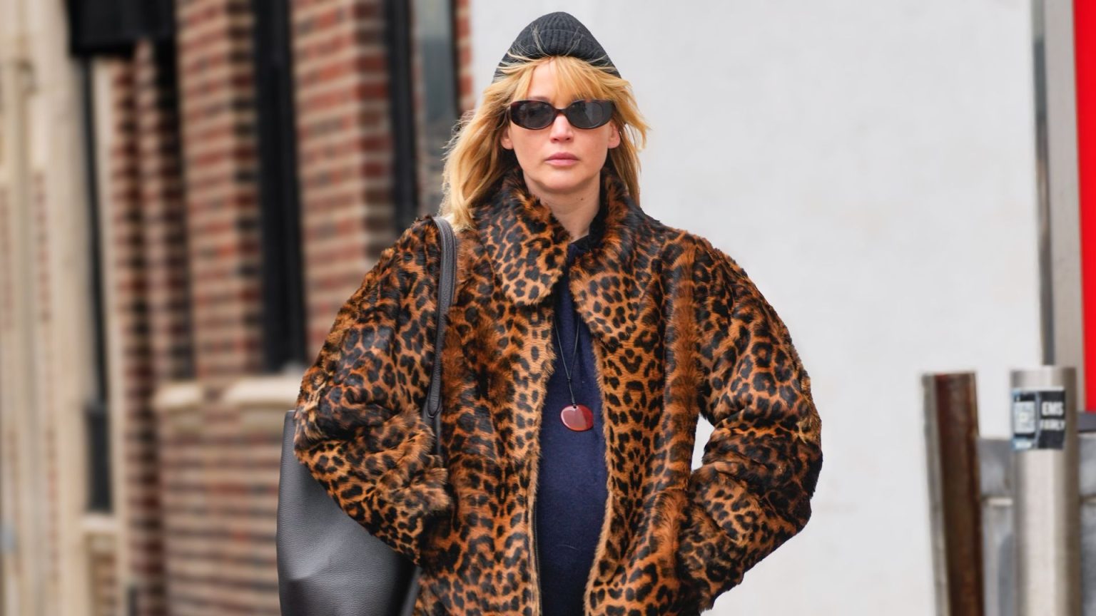 Jennifer Lawrence proves maternity style can be seriously fierce in bold leopard print coat