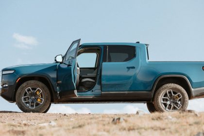 Rivian inches closer to profitability but warns ‘changes to government policies’ could hurt