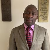 UK-Based Cameroonian Pastor Accused Of Fraud, Fleeing Nigeria After Orchestrating NSCDC Arrest Of Web Designer