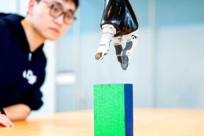 AI enables paralyzed man to control robotic arm with brain signals