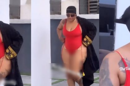 Fans reacts as Angela Okorie is seen covering her backside in raunchy swimsuit