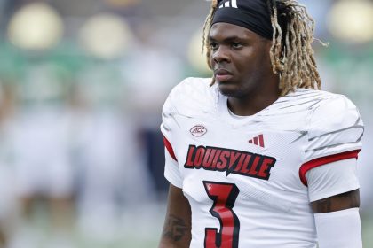 Louisville CB Quincy Riley visits with the Saints