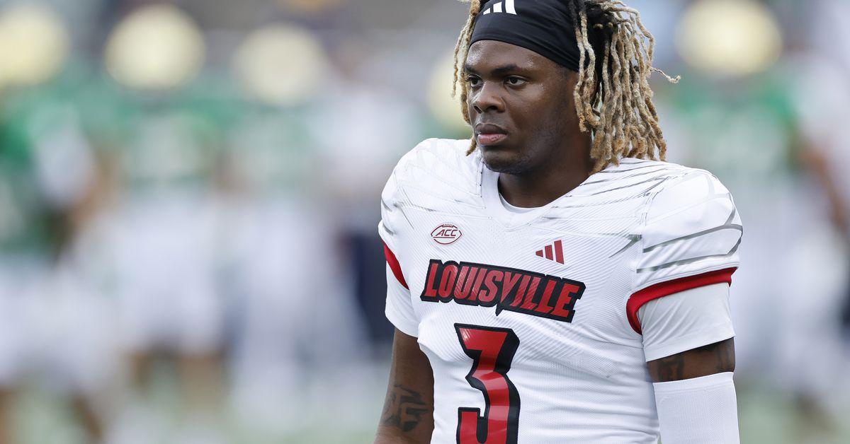 Louisville CB Quincy Riley visits with the Saints