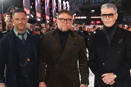 Pierce Brosnan and Tom Hardy cut stylish figures as they lead stars at MobLand premiere
