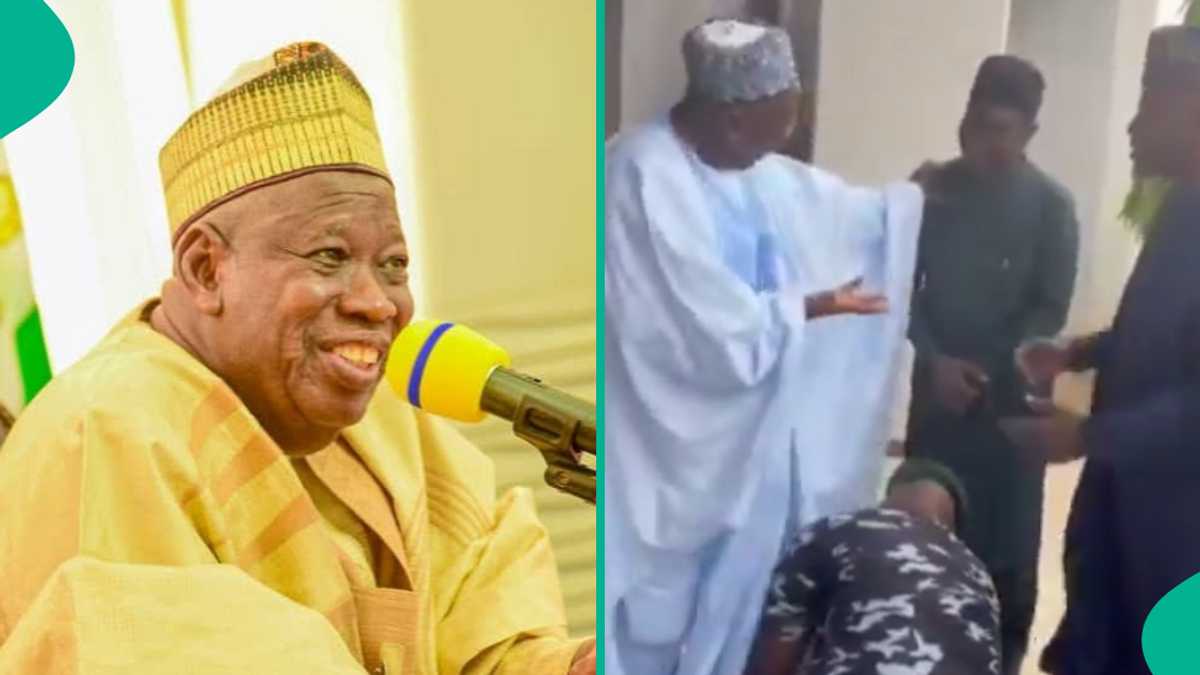 Moment police officer seen tying the shoelaces of APC national chairman, Ganduje