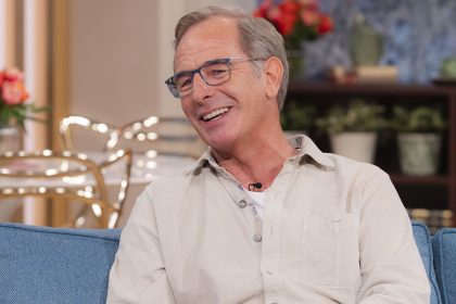 Robson Green surprises fans with ultra-rare photos of long-haired son Taylor