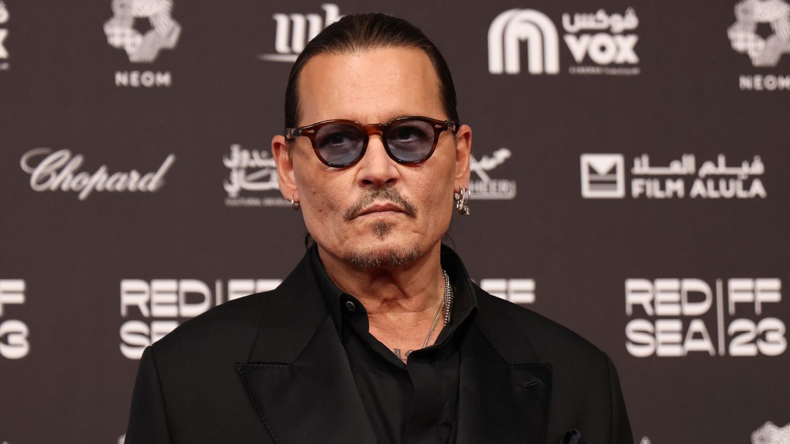 Johnny Depp looks completely unrecognizable with new silver fox makeover