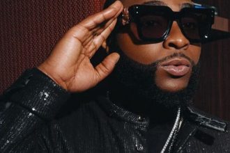 Davido flaunts $2 million diamond chains and $500K diamond teeth