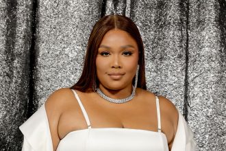 Lizzo stuns in new poolside video from her jaw-dropping backyard at LA home