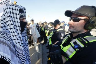Police arrest 11 protesters at CANSEC military trade show