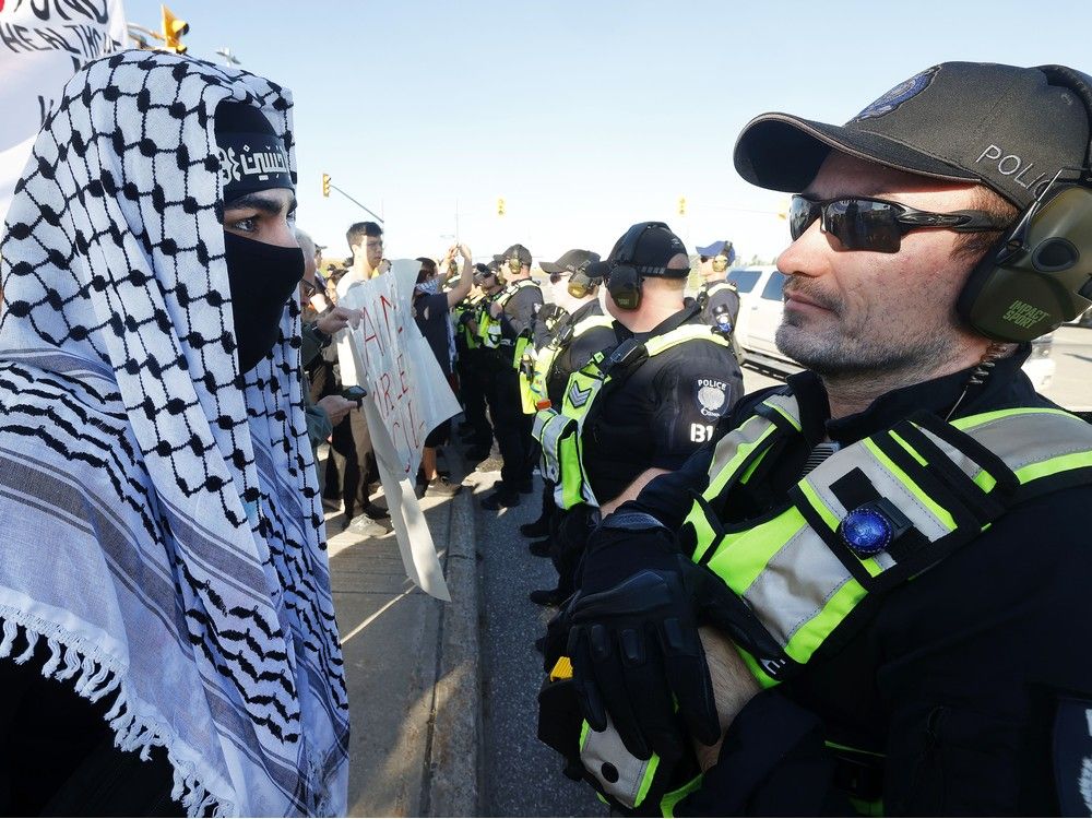 Police arrest 11 protesters at CANSEC military trade show