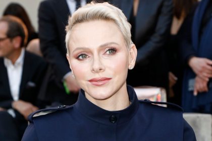 Princess Charlene looks edgy in leather with darkest hair to date