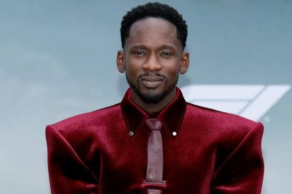 Mr Eazi in Burgundy Velvet is the Whole Moment at the “F1: The Movie” Premiere