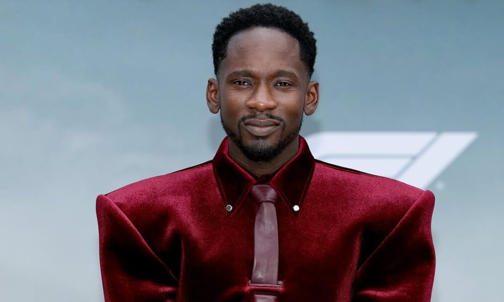 Mr Eazi in Burgundy Velvet is the Whole Moment at the “F1: The Movie” Premiere