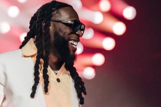 Burna Boy unveils album art for upcoming project ‘No sign of weakness’