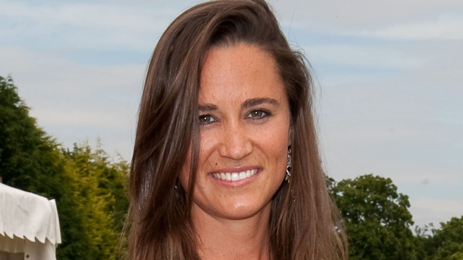 Pippa Middleton is the ultimate summer bombshell in waist-cinching dress and glowing tan