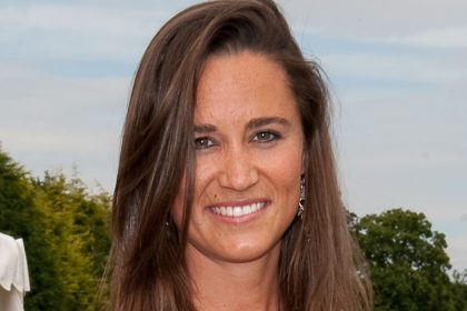 Pippa Middleton is the ultimate summer bombshell in waist-cinching dress and glowing tan