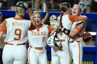 Women’s College World Series: Texas wins controversial Game 1 with go-ahead hit on attempted intentional walk