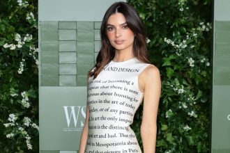 Emily Ratajkowski surprises in old school cloche hat to tease new Netflix series