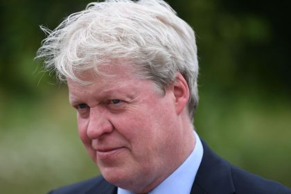 Charles Spencer appears to make thinly-veiled dig at ex-wife Karen as he makes red carpet debut with new partner