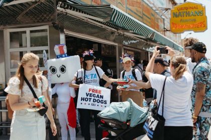 PETA distributes vegan wieners outside Nathan’s Hot Dog Eating Contest