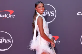 Gabby Thomas gets in on the all-white trend at 2025 ESPY Awards
