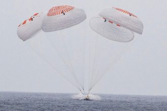Astronauts splash down in Pacific after completing ISS mission that relieved stranded crew members