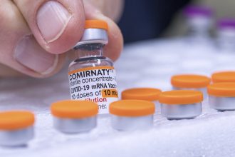 FDA Requires Updated Warning About Rare Heart Risk With COVID Shots