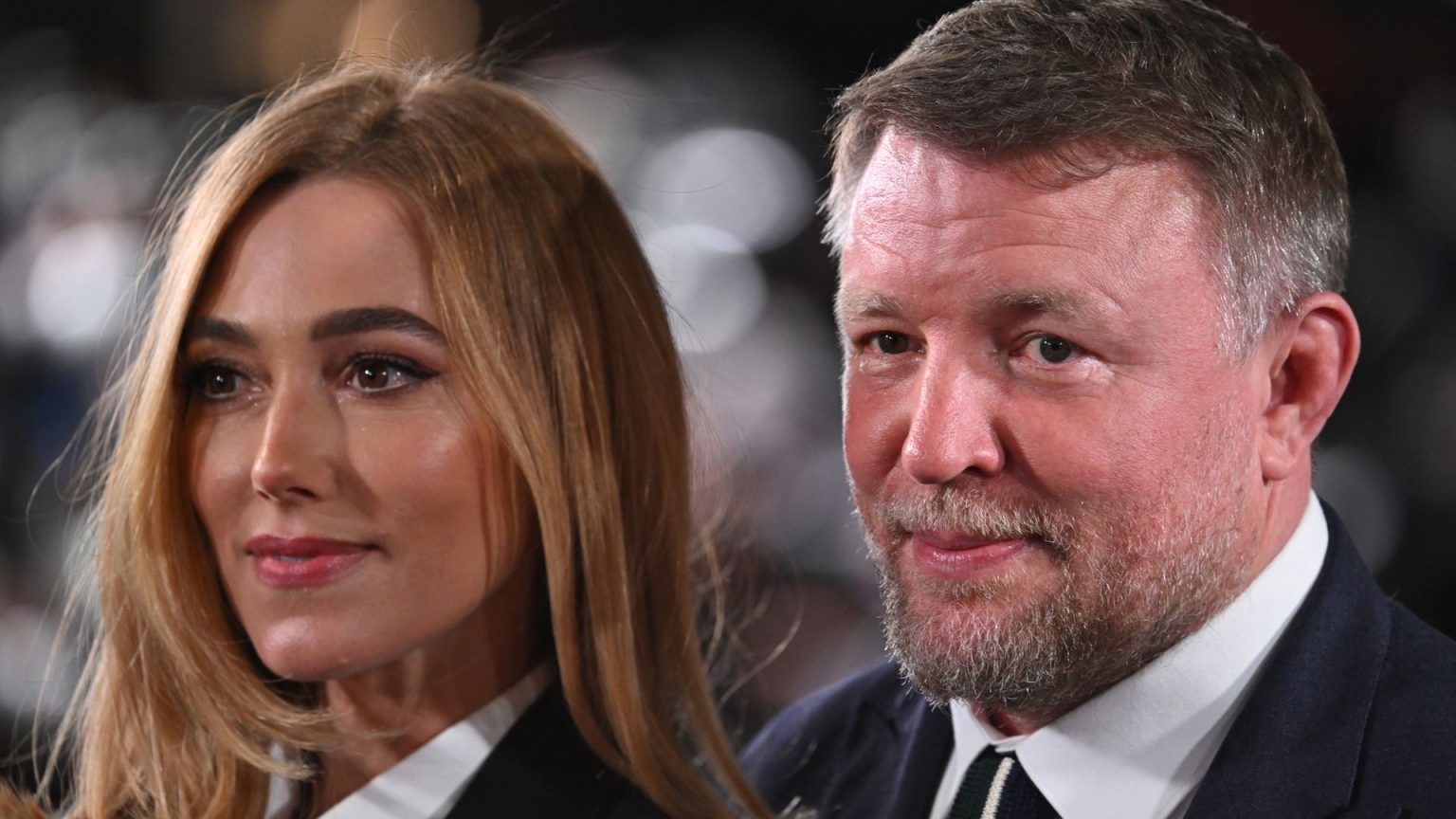 Guy Ritchie and lace-clad wife Jacqui manifest ‘change and growth’ at surprise Stonehenge vow renewal