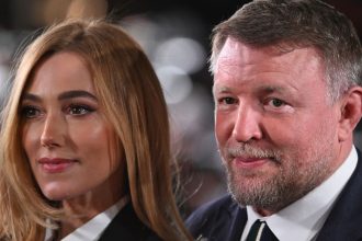 Guy Ritchie and lace-clad wife Jacqui manifest ‘change and growth’ at surprise Stonehenge vow renewal