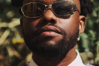Which 2 Afrobeats giants does Lojay want to see collaborate?