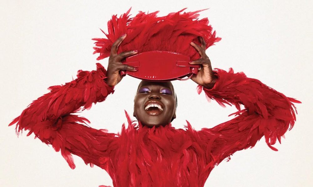 Feathers, Fruit, & a Blonde Afro: Adut Akech’s Vogue September Looks Are Unstoppable