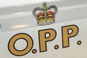 OPP officers struck by car fleeing illegal racing event