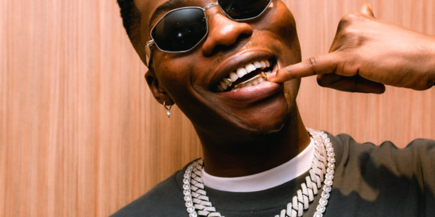 Reekado Banks fires back after critic mocks him for attending church