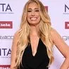 Stacey Solomon dazzles in a crystal-covered midi dress perfect for the festive season