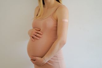 Getting a COVID Shot During Pregnancy Benefits Mom and Baby, New Analysis Shows
