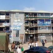 BREAKING: Police Crack Down On Abuja’s Building Materials Plaza With Tear Gas, Forcing Traders To Flee