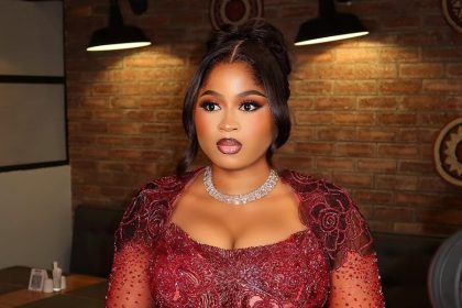 Imisi Served Glamour at the BBNaija Winner’s Party in Burgundy Lace & Swarovski Crystals