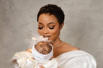 Too Cute! Toke Makinwa & Daughter Yakira Match in White for Dedication