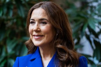 Queen Mary is a ‘breath of fresh air’ in waist-cinching jumpsuit and it-girl Bottega bag