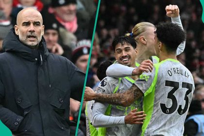 Pep Guardiola reacts as Manchester City go top of Premier League table with vital win