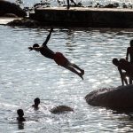 PHOTO ESSAY: Chilling out — Capetonians take to the water as heatwave sets in