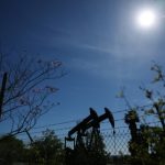 Crude prices surge, stocks sink as Iran warns of regional energy strikes