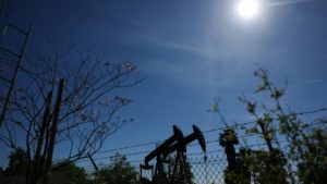 Crude prices surge, stocks sink as Iran warns of regional energy strikes