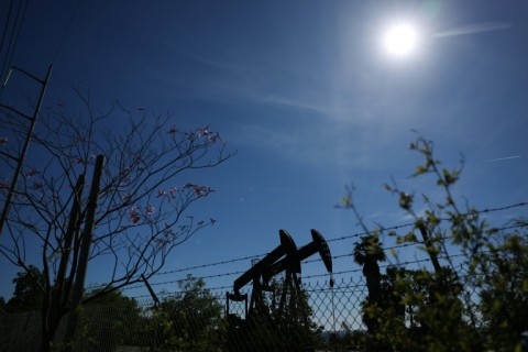 Crude prices surge, stocks sink as Iran warns of regional energy strikes