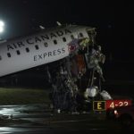 Runway collision kills two pilots, shutters New York airport