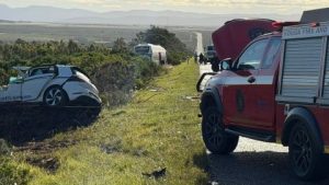 A traffic officer has died following a head-on collision with a bus