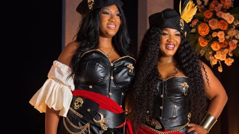 Black Leather, Red Sashes & Gold Chains: Omotola and Princess Ekeinde’s Matching Pirate Looks Are Beautiful