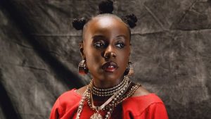 Teni Stuns in Head-to-Toe Red in Her New “Zion” Video With Olamide